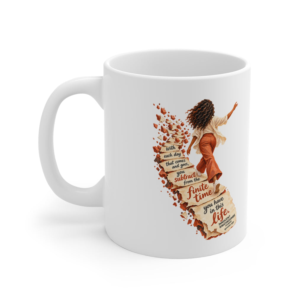 Finite Time white ceramic mug, handle on the left, showing a figure walking along a fragmenting path.
